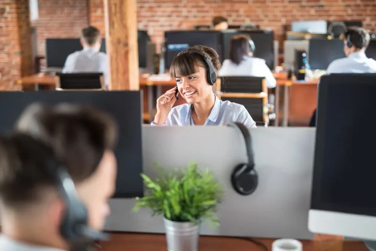 girl speaking on the phone in a contact center