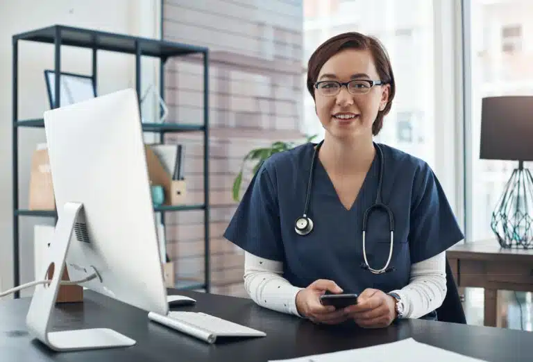 healthcare professional with phone