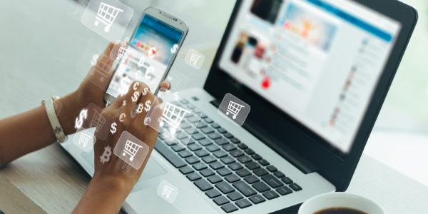 Businesswoman,Phone,And,Laptop,Using,,,Online,Shopping,Concept.